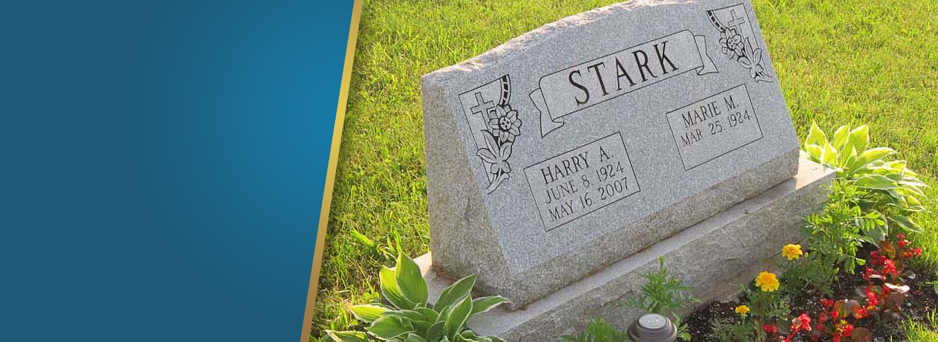 A granite headstone surrounded by flowers